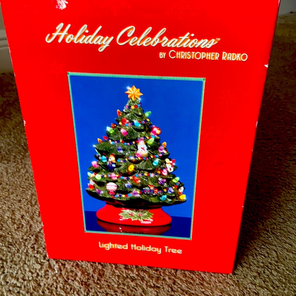 A Christmas tree lights up.